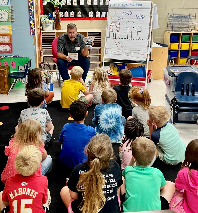 Wednesday was National Read a Book Day, and West Plains R-7 School District officials are saying &ldquo;thank you&rdquo; to Ryan Cundall of&nbsp;Leonardo DRS&nbsp;for taking time that day to read &ldquo;Maggie&rsquo;s Story&rdquo; to Tara Orr&rsquo;s kindergarten class. Kurt Peterson of Land Systems developed &ldquo;Maggie&rsquo;s Story,&rdquo; which tells the real tale of Maggie the Elephant being flown by the Air Force in a C17, from a zoo in Alaska to a zoo in California. During Maggie&rsquo;s trip, her transport container was loaded on the aircraft using a Tunner Cargo Loader produced at the Land Systems facility in West Plains, just eight blocks from the kindergarteners&rsquo; classroom.