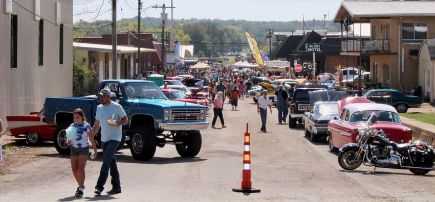 The Pioneer Days crowd is seen strolling down Oak Street among several of the dozens of classic cars that were part of a car show held as part of the Sept. 30 event in downtown Mtn. View.