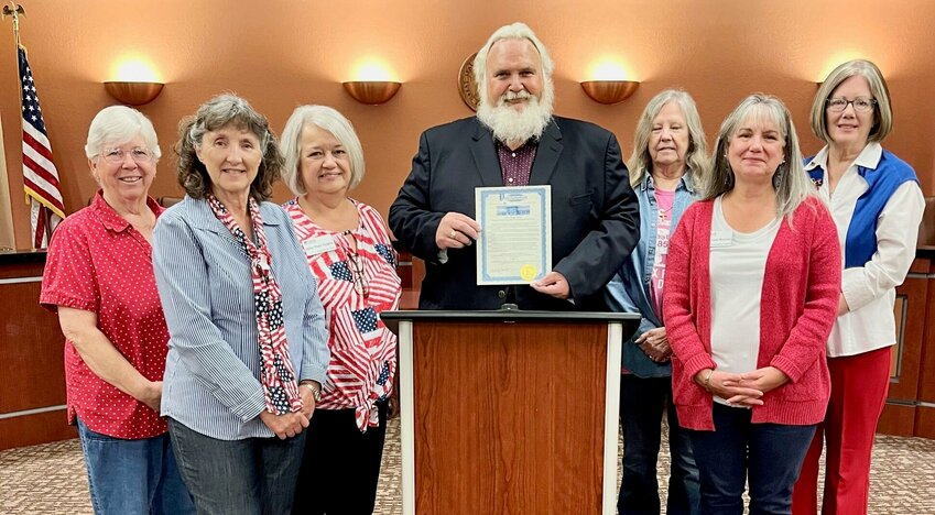 Joining West Plains Mayor Mike Topliff, center, for a recent proclamation to encourage literacy in West Plains are Ozark Spring chapter members of the National Society of the Daughters of the American Revolution, from left: Marla Burgess, Connie Weber, Chapter Regent Jan Tappana, LaVerna Williams, Chapter Literacy Chair Mary Ann Mutrux and Cathy Roberts.