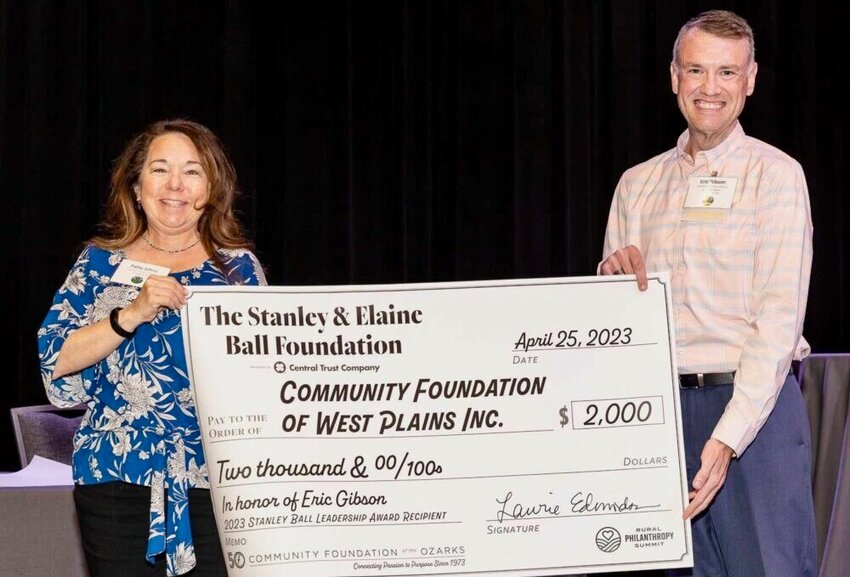 Eric Gibson, right, president of the Community Foundation of West Plains, was selected for the 2023 Stanley Ball Leadership Award. In Gibson&rsquo;s honor, the CFWP received a $2,000 grant.
