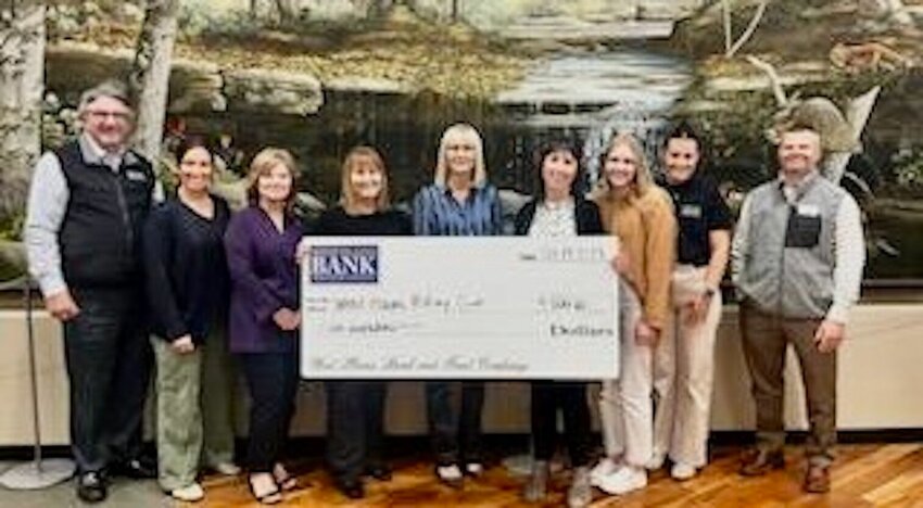 West Plains Bank and Trust Company is a $500 sponsor of the West Plains Noon Rotary Club Boots and Barbecue fundraiser for the Rotary Backpack Program set to start at 5:30 p.m. Friday. Tickets to the fundraiser at Rubydoo&rsquo;s Event Center, 9420 County Road 9190, are $40 in advance and $50 at the door. Festivities will include a barbecue dinner, cash bar, music, live auction, hay rides and a &ldquo;cash bubble house&rdquo; game. To purchase tickets, go online to eventbrite.com and search for &ldquo;Boots &amp;amp; BBQ&rdquo; hosted by the West Plains Noon Rotary Club, or visit Ozark Marketing Company, 983 E. U.S. 160, or State Farm-Ramona Heiney, 1024 Porter Wagoner Blvd., both in West Plains. From left, Scott Corman, Kara McGinnis, Karen Smith, Vicki Belt, Ramona Heiney, Becky Brewer, Bailey Stephens, Cass Denton and Nathan Cropper.