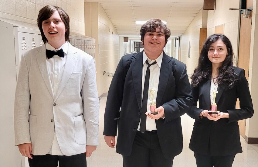 Willow Springs High School Speech and Debate competitors Braiden DeWitt, center, and Macy Pearson, right, were third place finalists in Duo Interpretation Nov. 18 at the Marion C. Early High School Speech and Debate Tournament in Morrisville, Polk County.&nbsp;Caleb Martin, left, also advanced to the semifinals in competition against both novice and varsity level participants.