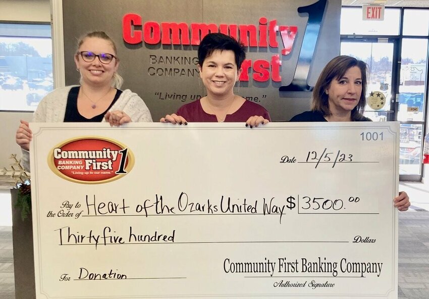 Community First Banking Company and its employees have donated $3,500 to Heart of the Ozarks United Way&rsquo;s annual fundraising campaign. The donation will be disbursed to the United Way&rsquo;s partner nonprofit agencies: 37th Judicial CASA, Christos House, Agape House, Samaritan Outreach, Sadie Brown Cemetery, Girl Scout Hut of West Plains, Mtn. View Youth Center, Willow Springs YMCA, Girls and Boys Club of Thayer and the Single Parent Scholarship Fund of Fulton County, Ark.&nbsp;&ldquo;We are extremely grateful for the annual donation from Community First Banking Company,&rdquo; said local United Way Director Stacy Tintocalis. &ldquo;Each year their generous donations have made a huge impact on our partner agencies.&rdquo; Heart of the Ozarks United Way raises funds for 10 partner nonprofit agencies and runs three internal programs that support low-income households. Each year, businesses and individuals can make tax-deductible donations to Heart of the Ozarks United Way to support their partner agencies. For more information, visit Heart of the Ozarks United Way&rsquo;s website at www.heartoftheozarksunitedway.org.&nbsp;From left: Ambrosia Brege and Ruth Li-Whittington with Community First and Tintocalis.