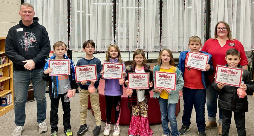 Seven West Plains Elementary second grade students were recently recognized as Character Kids, with this month&rsquo;s theme of &ldquo;Gratitude.&rdquo; Community First Banking Company of West Plains sponsors the program. From left: Assistant Principal Joby Steele, Liam Reed, Daden Fullington, Olivia Havilland, Avery Story, Jaelyn Causey, Grayson Osgood, Cooper Lange and bank employee Carrie Siegman.