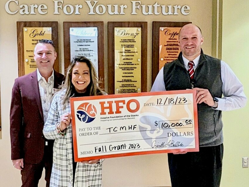 Present for the presentation of a $10,000 grant award, from left: Hospice Foundation of the Ozarks Executive Assistant Matt Day and Executive Director Anjanette LaBellarte, and Texas County Memorial Hospital Healthcare Foundation Director Jeff Gettys.
