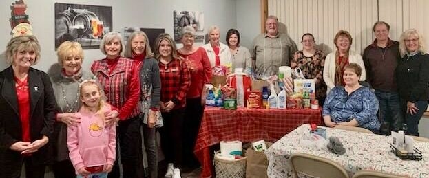 West Plains Lions Club members recently made a donation to Martha Vance Samaritan Outreach Center of paper products, nonperishable food items, paper products and cleaning supplies. Members presenting the donation, from left: Vice President Reta Reed, Joy Holloway and guest Caroline Pendergrass, Marsha Kelly, Marcie Mickey, Traci Wiley, Carolyn Hoover, Chris Scharff, Kelli Mayberry, John Warner, Taylor Grose, President Brenda Smith, Lesa Hall, Dr. Knial Piper and Elania&nbsp;Piper.