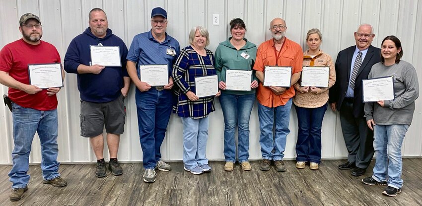 Eight employees at Arlee Home Fashions in West Plains recently completed U.S. Department of Labor-registered apprenticeship programs through Missouri State University-West Plains. From left are Arlee apprenticeship graduates William Brashers of West Plains, Jason Brege of Pottersville, Rick Williams of Elk Creek, Brenda Carmen of Thayer, Jonie Brege of Dora, and Greg Williams and Amy Eades of West Plains; Garland Barton, coordinator of corporate education and business engagement at MSU-WP; and Arlee apprenticeship graduate Nicole Beltz of Willow Springs.