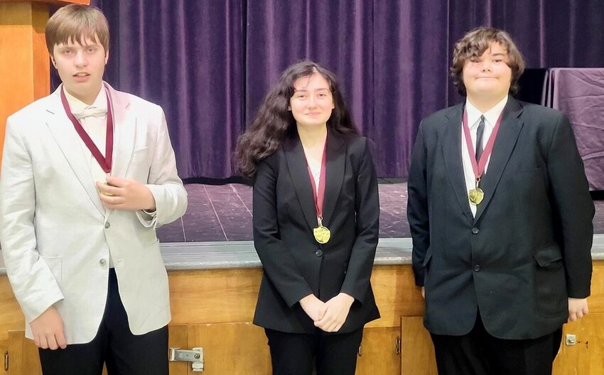 Willow Springs High School students Caleb Martin, left, Macy Pearson, center, and Braiden Dewitt recently competed at the Mtn. Grove High School Speech and Debate Tournament. Martin earned sixth place in Humorous Interpretation, while Pearson and Dewitt made fourth place in Duo Interpretation.