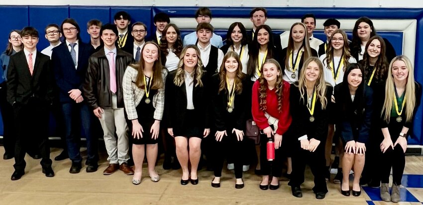Front row, from left:&nbsp;Atley Woods, who placed in the top five; Crystal Edwards; Lilly Quarles, top five; Kaden Vardell; Kylie Forrester, top five; Ashlee Jackson; and Brooklyn Leonard, top five. Second row: Brendon Spencer, Michael Cali and Corwin Mullins; Mitchel Nelson, top five; Lilly Tucker; and top five placers Curtis Stockle, Adeline Cypret, Savannah Jackson, Hailey Gorham, Leah Quarles and Jaycelyn Wright. Back row:&nbsp;Skylar McDaniel, Dirk Deckard and Trenton Johnston; District 14 President Gus McFann and Jake McFann, top five; Dustin Adams; Brady Justus, top five; Brady Parker; Aidan Harvey, top five; and Jadyn Allen. Cayson Honeycutt also placed in top five.