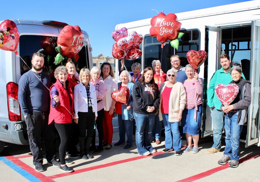 West Plains Family Dollar employees and a small army of &quot;Cupid's helpers&quot; met Valentine's Day morning to help deliver balloons and chocolates to local nursing home residents. The treats were purchased with donations made by Family Dollar customers, and the idea was the brainchild of Store Manager Mary Robnette. A total of 270 balloons and 33 boxes of chocolates were delivered to Brooke Haven Healthcare, NHC HealthCare, West Vue and Cedarhurst by volunteers from the First United Methodist Church, First Presbyterian Church, First Baptist Church, and the nondenominational Spring Creek Church. From left: Family Dollar Assistant Manager Kent Deweese, Vicki Shaw, Robnett, Michelle Stirewalt, Judy Tuma, Kristin Gullic, Kathy Schloss, Mary Jones, Carrie Brassfield, Chris Scharff, Loretta Bradshaw, Brandon Harris, Melissa Heath, Charlie Brownley and Ellen Bivens.