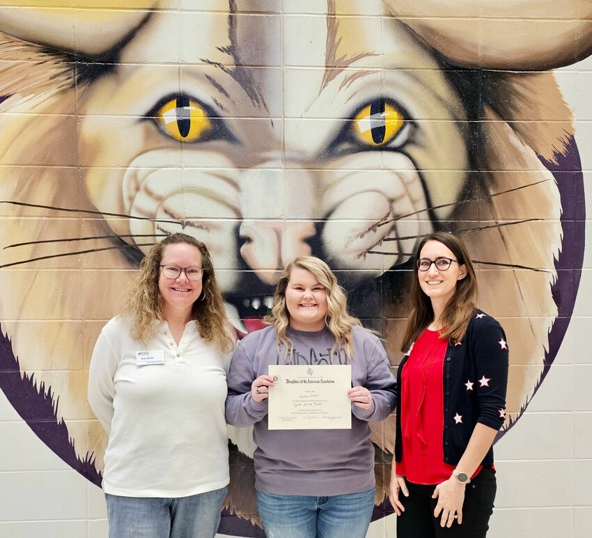 At center, Captolia Boyer of Winona High School was recognized as a DAR Good Citizen with a certificate presented by Daughters of the American Revolution, Ozark Spring chapter members Sue Smith, left, and Samantha Hodges, committee charge. Boyer is the daughter of Jaquita Thompson.