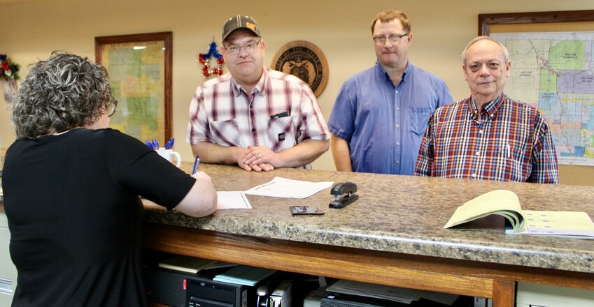 Tuesday was the first day of filing for candidates to be placed on the ballot for the Aug. 6 primary election, and several lined up at the Howell County Clerk Kelly Waggoner's to get the job done early. From left: Waggoner is signing up Northern Commissioner Calvin Wood and Public Administrator John Pruett, both running for reelection, and Dr. Gary DeShazo, West Plains, who is running for the office of Howell County Coroner held by Tim Cherry. Filing for the August election runs through March 26, with a final certification date of May 28. For unregistered voters, the last day to register to vote in that election is July 10. The Howell County Clerk's Office is at 35 Court Square in West Plains. To register to vote in person, bring a current government-issued photo ID. A receipt from a political party showing proof of a paid filing fee is also required in order to file as a candidate, along with a government-issued photo ID. Provisional ballots may be cast if the voter is registered, but doesn't possess any of the official forms of identification, however, the ballot will only be counted if the voter returns to their polling place on election day with a valid photo ID or the signature on the provisional ballot envelope is determined by the local election authority to match the signature on the voter registration record. Municipal and school board elections will be held April 2; the last day to register to vote for that election is March 6.