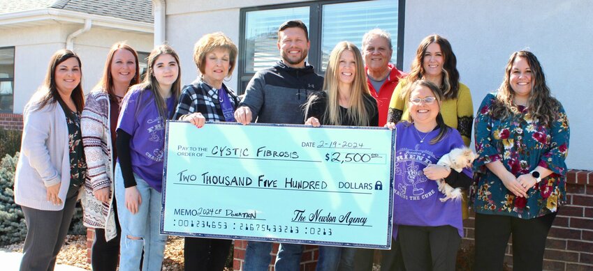 Newton&rsquo;s Agency, a longtime supporter of the annual Cystic Fibrosis Concert fundraiser, recently donated $2,500 to support research into the genetic respiratory disease, for which there is no cure. It is the 36th year for the event featuring country artist Sara Evans, a Boonville native and a Grand Old Opry inductee. The concert will be March 16 at the West Plains Civic Center, 110 St. Louis St. Doors open at 5 p.m. with silent and live auctions to follow, and local volunteer singing group Jessica's Friends will open for Evans, who will take the stage at about 8 p.m. Tickets for adults are $30 in advance or $40 at the door, and $5 for children age 12 and younger, in advance or at the door. They may be charged by phone by calling the civic center at 417-256-8123, or online at Ticketmaster.com/Sara Evans. Tickets are also available in person at West Plains area banks, West Plains Music, West Plains Walmart, K-Kountry 95 radio station in Thayer, and from Regina Voyles in Winona and Sarah Honeycutt in Cabool. From left: Newton&rsquo;s employees Adrienne Peeler and Jeanette Carrell, Cystic Fibrosis of West Plains volunteers Lily Smith and Lois Frazier, Newton&rsquo;s Administrator Jimmy Miller and nurse/Manager Amanda Mitchell, Cystic Fibrosis volunteers Rick Frazier and Jessica Joice-Frazier, and Newton&rsquo;s employees Sondra Meany and LaToya Vandenbulcke.