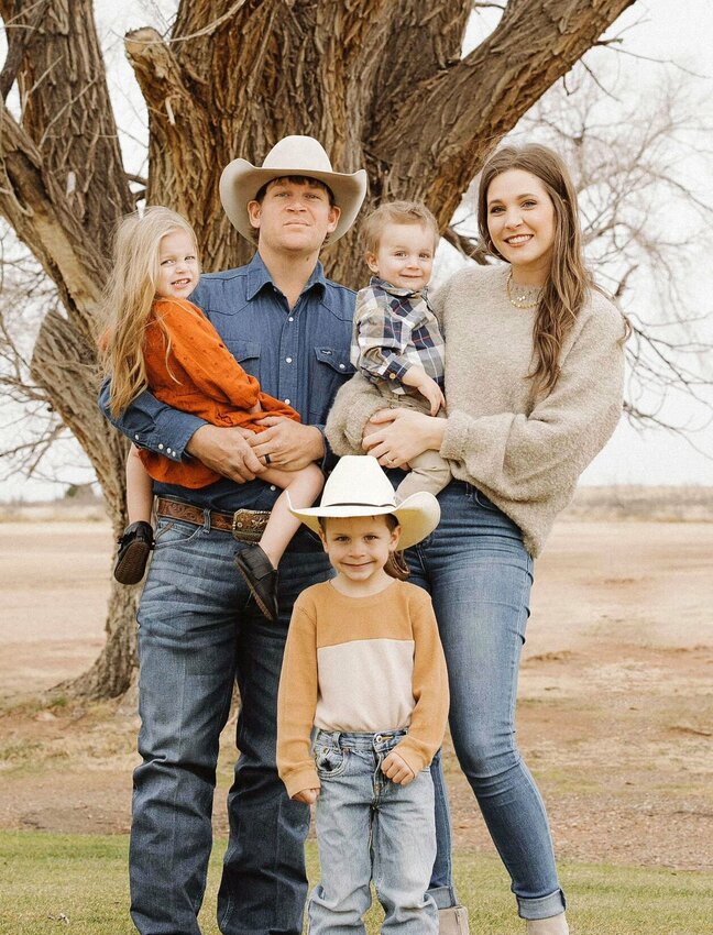 FORMER PRO RODEO COWBOY and West Plains resident Matt Hughes will be returning home to coach Missouri State University-West Plains&rsquo; (MSU-WP) first collegiate rodeo team this fall. With him above are his wife, Megan, and children Tilden (standing in front), Layton (held by Megan) and HeidiRae (held by Matt).