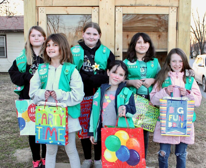 Members of local Girl Scout Troop 71546 of West Plains recently made 10 &quot;Birthday in a Bag&quot; donations and left half of them at the Giving Tree at Rescue Church on the corner of Sixth Street and Minnesota Avenue and the other half at the food pantry at nearby Martha Vance Samaritan Outreach Center. The &quot;Birthday in a Bag&quot; contains a disposable cake pan, cake mix, frosting and a celebration banner, recognizing that struggling families still deserve to celebrate birthdays even if they can't afford a cake and the trimmings. Co-leaders Sara Chapman and Cassandra Sloniker praised the girls for choosing the project as a way to help families and expressed pride in the troop's commitment to community service projects. From left are Annalise Grose, Aria Ziino, Adaleah Roberts, Chloe Girdley, Emily Hatcher and Kinslea Chapman.