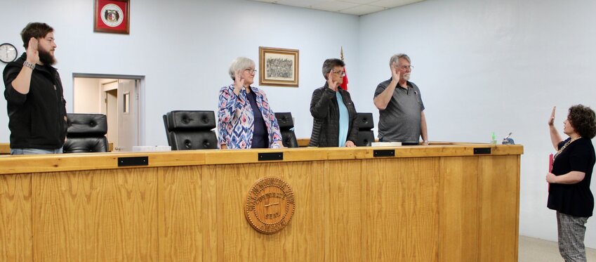 An all-new council &mdash; including a mayor and three council members &mdash; was sworn in at Tuesday night&rsquo;s meeting of the Mtn. View City Council by Howell County Clerk Kelly Waggoner, filling in while the city hires a permanent city clerk. East Ward Alderwoman Judi Colter is the only member with previous experience, having served from 2020 to 2022. From left: East Ward Alderman David Bauer, Mayor Charry McCann, Colter, West Ward Alderman Calvin Perry and Waggoner.