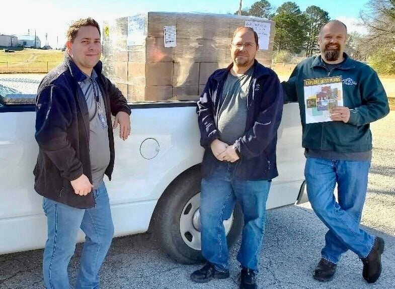 Staff members of the City of West Plains Purchasing Department and Warehouse have been making deliveries of the 2024 Explore West Plains guidebook. From left: Kristopher Bates, Marc Brannan and Lucas Douglas.