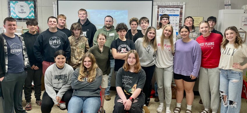Dr. Janet Brewer's West Plains High School physical science classes recently welcomed Dave Bryant, a seasoned riverboat captain from the American Commercial Barge Line boat company. With 17 years of river experience, Bryant connected wave studies with his real-life adventures on the Mississippi River traveling along the St. Louis to Baton Rouge route.