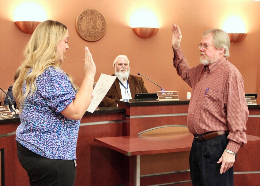 West Plains City Councilman Johnny Murrell was sworn in by City Clerk Kellie Mayers at Monday night's regular monthly meeting, after being reelected April 2. Murrell ran unopposed and was also appointed to the West Plains Public Library committee as part of the evening's agenda to reorganize. Other council member committee appointments made were Jessica Nease as Mayor Pro-Tem and ex officio member of the civic center committee; Mayor Mike Topliff and Greg Collins to Planning and Zoning; and John Niesen to Tourism.