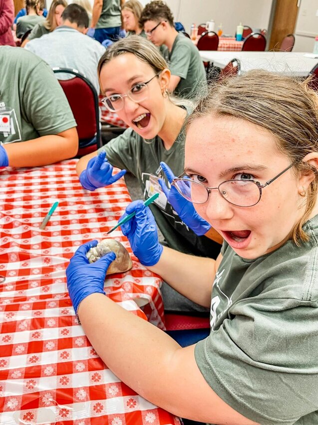Students from a previous M*A*S*H Camp at Ozarks Healthcare dissect a sheep heart.