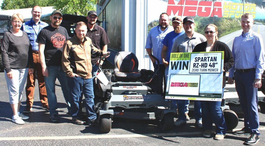 Mega Motorsports is a hole-in-one prize sponsor of this year's Greater West Plains Area Chamber of Commerce Caddyshack Classic Golf Tournament, to be held Friday at the West Plains Country Club. It is a three-person scramble with a noon shotgun start preceded by a golfer's lunch at 11 a.m. The hole-in-one prize is a 2023 Spartan 48-inch zero turn radius mower with a retail value of more than $5,000. To sign up to register, email info@wpchamber.com. From left are Chamber Ambassadors Shirley Butler and Greg Carter, Mega Motorsports employee Tim Lockett, owner Travis Olmsted, manager Luke Stokes, employees Brandon Creech, J.L. Huckabey, Mike Morrison, Jenni Wensted, and Chamber Board Chairman Eric Gibson.