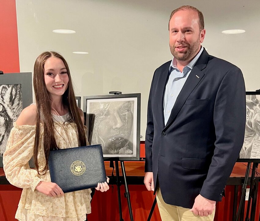 Miah Bressie, left, a Houston High School senior, is Missouri District 8&rsquo;s first place winner in this year&rsquo;s Congressional Art Competition, chosen by Rep. Jason Smith.