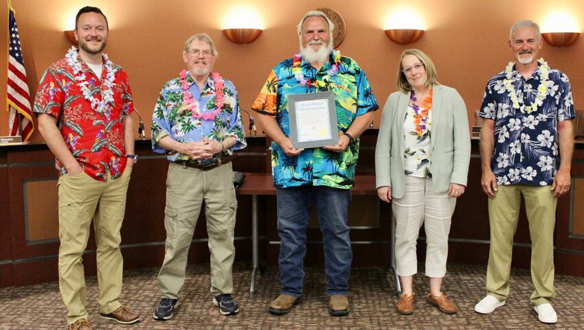 West Plains Mayor Mike Topliff, invoking warm tropical breezes, sandy beaches and the relaxation related to the &quot;aloha&quot; culture of Hawaii, has declared each Friday from Memorial Day through Labor Day to be Hawaiian Shirt Day. The tradition has been in place for several years in West Plains, at least informally, and Topliff recalled fond memories as a former resident of Hawaii during his service in the U.S. Navy. West Plains residents are encouraged to wear the shirts to celebrate the ends of their work weeks this summer. West Plains City Council members leading the trend, from left are John Niesen, Johnny Murrell, Topliff, Mayor Pro Tem Jessica Nease and Greg Collins.