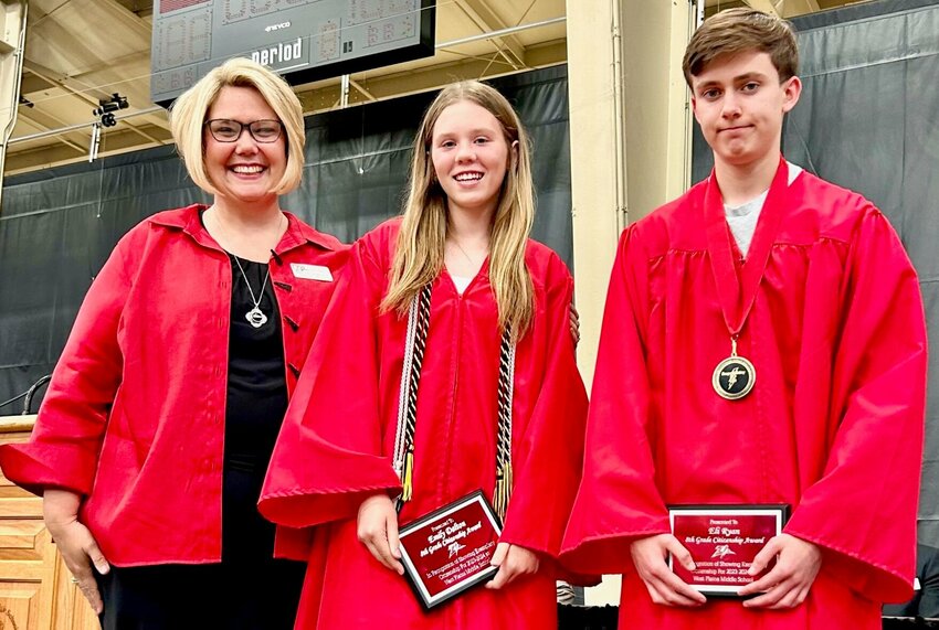 Emily Dalton, center, and Eli Ryan, right, each received the Citizenship&nbsp;Award on May 13&nbsp;at the West Plains Middle School eighth grade promotion. The honor recognizes&nbsp;students&nbsp;who inspire and encourage their peers to be better citizens. Presenting them with their awards is Assistant Principal Erica Walker.