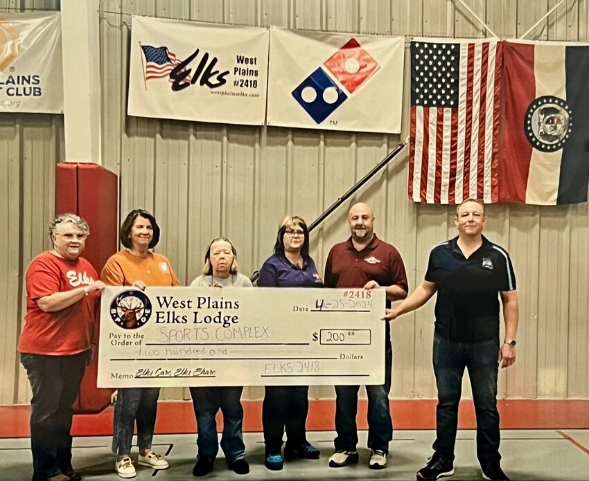 The West Plains Elks Lodge recently presented a check for $2,000 to the Jimmy Carroll Winter Sports Complex. From left: Janet Parker, Gwen Roberts, Jan Dutton, Liz Ford, Jacob Deckard, and Nathan Callahan.