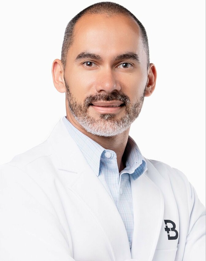Dr. Nestor Arita