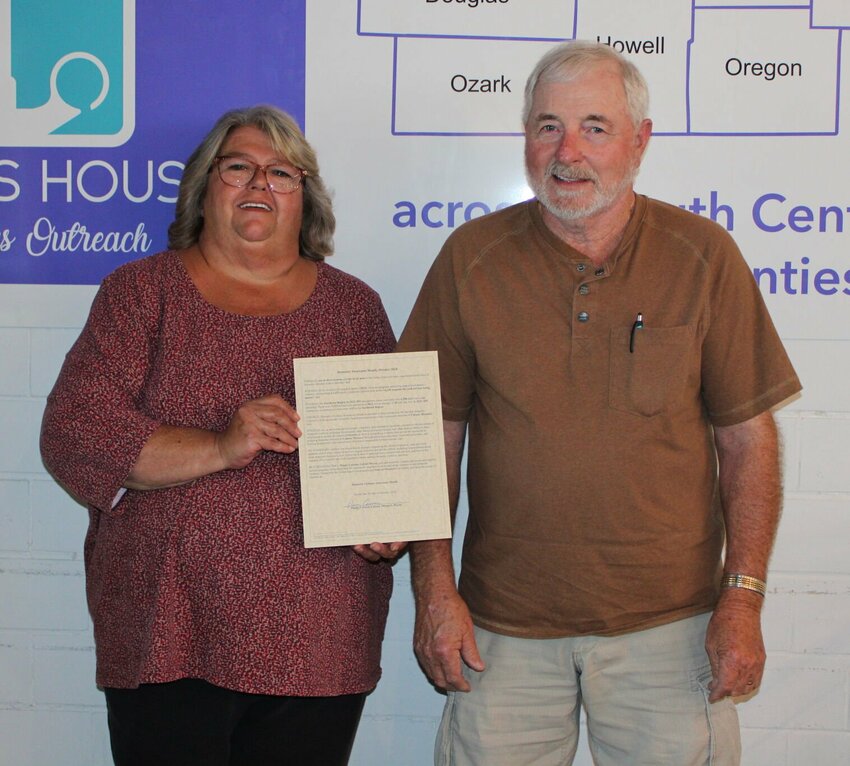 In recognition of National Domestic Violence Awareness Month, Cabool Mayor Danny Cannon, right, recently stopped by the Christos House Resale Shop in West Plains to sign a proclamation in support of domestic abuse awareness on behalf of the city of Cabool. Texas County is part of the Christos House service area, which also includes Howell, Ozark, Douglas, Wright, Oregon, Shannon and Carter counties. Besides awareness and prevention, the agency partners with the communities it serves to connect survivors with services and collects data showing the need and success of those services. With Cannon is Christos House Outreach Advocate Brenda Lewis.