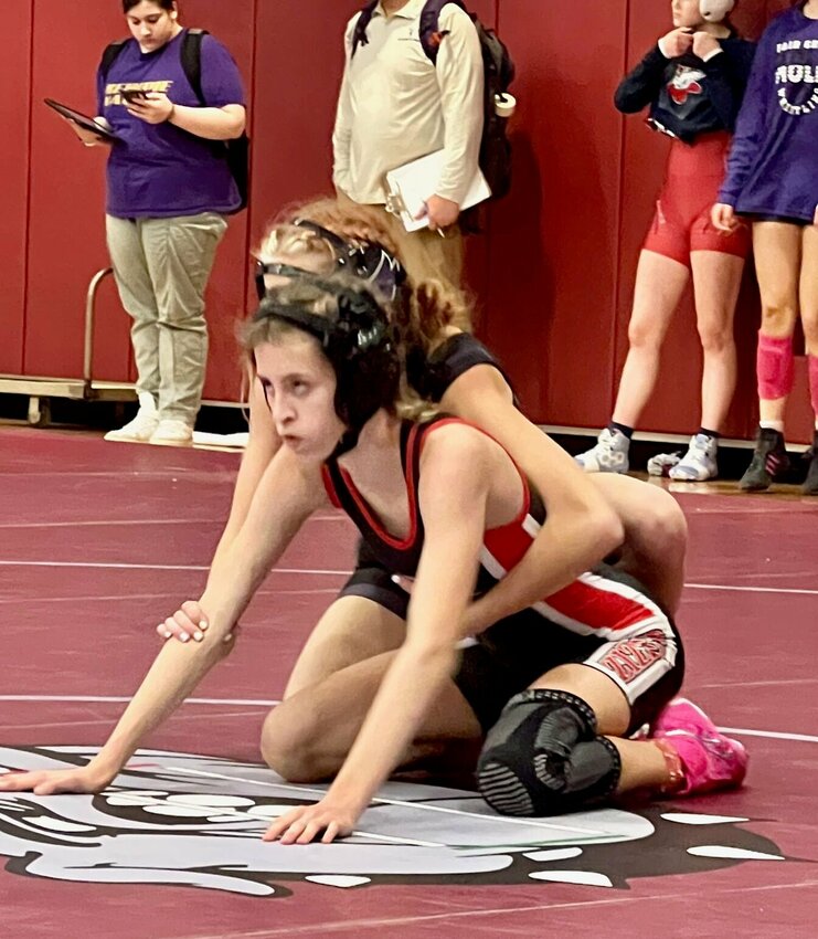 Lady Zizzer Wrestler Edie Hart takes on an opponent from Fair Grove during Saturday&rsquo;s Tough as Nails girls tournament in Rolla. She took fourth place.