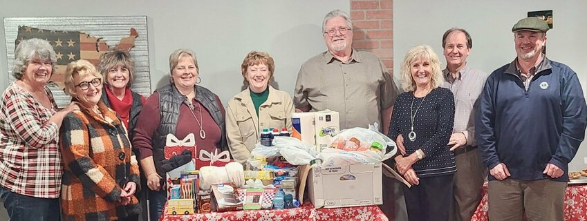 The West Plains Lions Club recently held a Christmas party during which members collected cleaning supplies, hygiene items, food pantry groceries, blankets, socks and other needed items, plus monetary&nbsp;donations. All were delivered to the Martha Vance Samaritan Outreach Center. Lions Club members, from left: Carolyn Hoover, Joy Holloway, Reta Reed, Lesa Fox Hall, Brenda Smith, John Warren, Elena Piper, Dr. Knial Piper and Tom Caldwell.