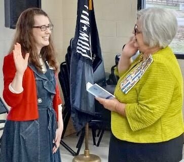 Members of the Ozark Spring chapter of the National Society Daughters of the American Revolution welcome new member Angela Anderson, left, of West Plains. Administering the Oath of Membership is Chapter Registrar Jan Tappana. To join, Anderson proved direct lineal descent from Revolutionary War patriot Robert Holmes, who served in both Pennsylvania and North Carolina during the Revolution. Holmes was born Jan. 5, 1748, in Ireland, and served as a private during the war, was held prisoner and died Feb. 24, 1838 in Sumner County, Tenn. Chapter members said they look forward to getting to know Anderson better and working with her during future service projects. The DAR is a nonprofit genealogical society whose members have proved direct lineal descent from patriots who served or provided goods in the American Revolution. Its motto is &quot;God, Home, Country,&rdquo; and its stated chief purpose is to support the pillars of historic preservation, education and patriotism. Women who are 18 or older and can prove direct lineal descent from a Revolutionary War patriot are eligible to apply for membership into the organization and may contact Chapter Regent Rebekah McKinney at 573-778-5116 or Tappana at 573-881-0408.
