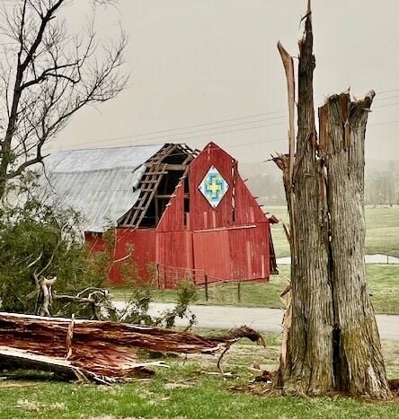 Sue Neitzel snapped this pic of a barn roof and trees that took significant damage in Friday night's storm. The barn, on County Road 8680 near Fiddlesticks Flea Market, also heavily damaged in the storm, is owned by Rob and Debbie Stauffer and was the subject of a photo by Neitzel that was published in the Quill's online photo gallery celebrating the first snowfall of the season on Jan. 15.    This caption has been updated to correct the names of the barn's owners.