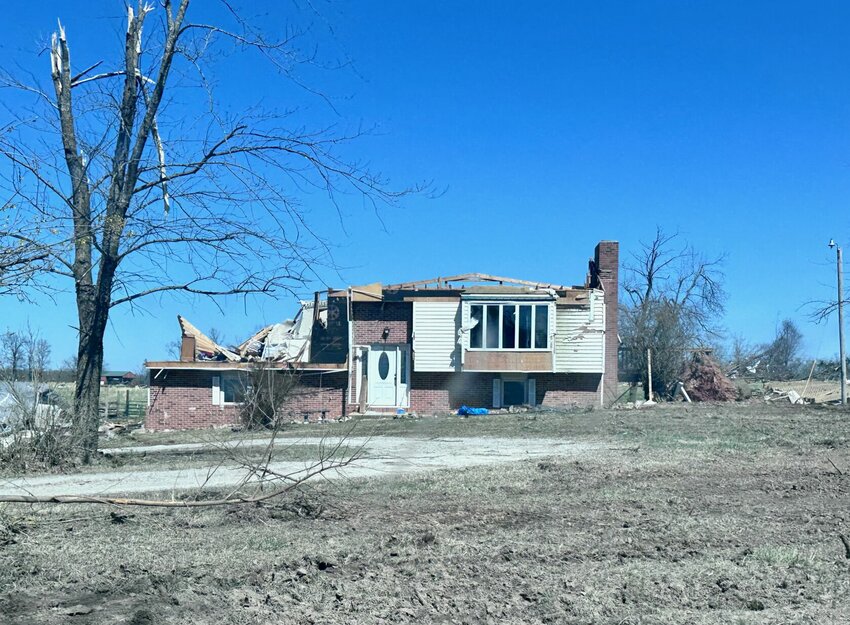 These two houses near Highway 17 south of West Plains are among those that show the signs of damage attributed to strong thunderstorm winds by the National Weather Service Storm Survey Team. The winds occurred during a Friday night storm that produced the confirmation of two tornadoes in the area, an EF-1 that touched down near Rover in Oregon County, and an EF-3 that touched down in Gamaliel, Ark., traveled through Bakersfield in Ozark County, and lifted up near South Fork in Howell County.