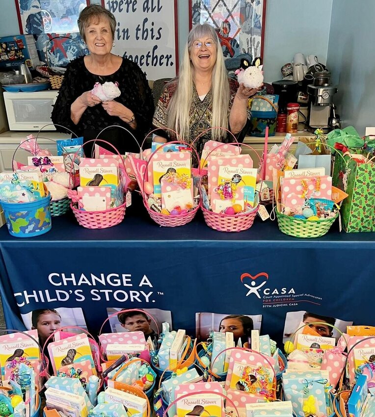 Connie Pendergrass,left, and Kathleen Wolfe are staff at the 37th Judicial Court Appointed Special Advocates organization. Birthday Blessings dropped off 32 &ldquo;Bunny Blessings&rdquo; Easter baskets that CASA advocates will deliver to area foster children.