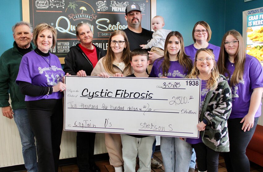 Captain D's of West Plains and the Stokes family have been supporters of Cystic Fibrosis of West Plains fundraising efforts for many years, and this year contributed $2,500 for research into treatments and cures for the genetic condition. Cystic fibrosis affects the respiratory and digestive systems of sufferers, resulting in lifelong treatment of symptoms, and the donation was the result of a recent fundraising day at Captain D's, when proceeds of food sales were given to the cause. Front row, from left: Cystic Fibrosis of West Plains volunteer Lois Frazier, restaurant employee Lily Smith, Stetson Stokes and Cystic Fibrosis volunteers Kaigan Barker, Jessica Frazier and Katlyn Johnson. Back row, from left: Cystic Fibrosis volunteer Rick Frazier, restaurant employee Crystal Smith, and business owners Zack, Maguire and Jessica Stokes.