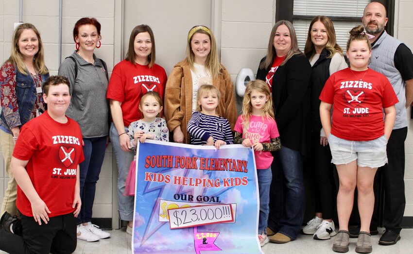 South Fork Elementary students and staff raised $23,000 this year for St. Jude Children's Research Hospital through its &quot;Kids Helping Kids&quot; campaign in partnership with the K-Kountry 95 St. Jude Radiothon. Since 2010, the kindergarten-through-sixth-grade school has raised about $148,000 total for the nonprofit Memphis hospital that treats children and conducts research into childhood diseases and cancers without charge to families. The most recent effort topped last year's donation by about $1,000. Front row, from left: students Ben Dalton, Gaby Miller, Vyolette Riggs, Hazel Riggs and Aubry Holmes. Back row: teachers Jennifer Ryan, Caty Holmes, Heather Miller, Nichole Riggs, Ronna Dalton, Camisha Hunter and Principal Dr. Seth Huddleston.