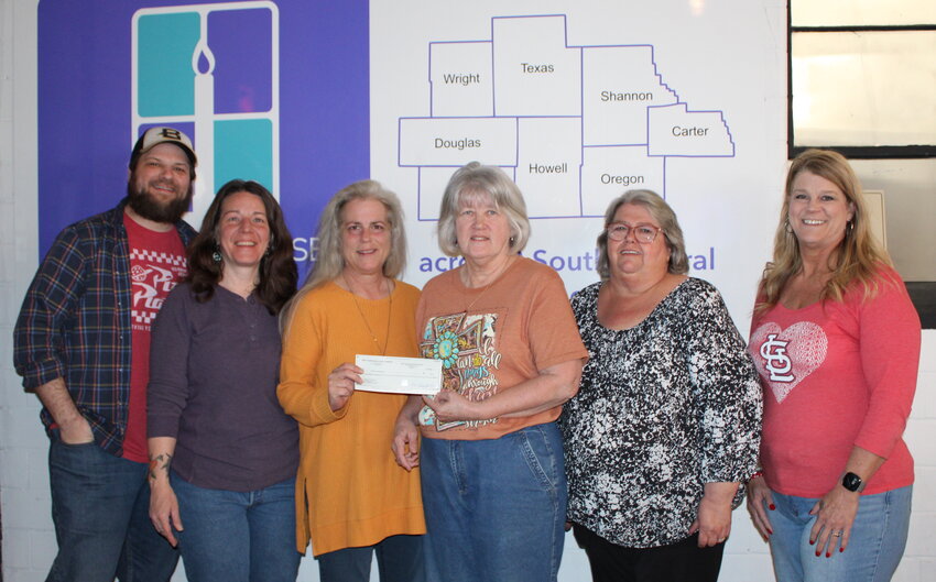 West Plains Bank &amp; Trust is a $500 sponsor of the upcoming Christos House Chocolate Festival fundraiser. It's the 20th year for the event, to be held from noon to 4 p.m. May 10 at First United Methodist Church, 503 W. Main St. Chocolatiers are encouraged to whip up batches of chocolate treats in the categories of cakes, cookies, candy, pies, and &quot;wild card.&quot; Entry forms may be found online at christoshousemo.org/events and are due May 2. Christos House is a nonprofit emergency shelter and service provider for survivors of domestic and sexual violence in Howell and Oregon, Carter, Shannon, Texas, Wright, Douglas and Ozark counties. From left: Christos House Office Manager Nicholas Haring, Resale Shop Store Manager Amber McFarland, Christos House Executive Director Kelli Neel, Board Member Barb Linville and Outreach Advocates Brenda Lewis and Kenya Cook.