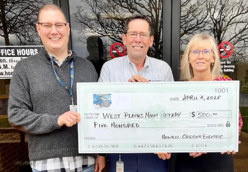 Howell-Oregon Electric Cooperative, represented by General Manager and CEO Dan Singletary, center, has donated $500 toward the West Plains Noon Rotary Club Backpack Program fundraiser. Tickets to a giveaway drawing to win a cruise and flights for two are being sold to help raise money for the program, which provides meals for school children on long weekends and over school breaks. They can be purchased at www.rafflecreatorcom/pages/45929/noon-rotary-cruise-fundraser-raffle. With Singletary are Noon Rotary Club members Greg Carter, left, and Ramona Heiney.