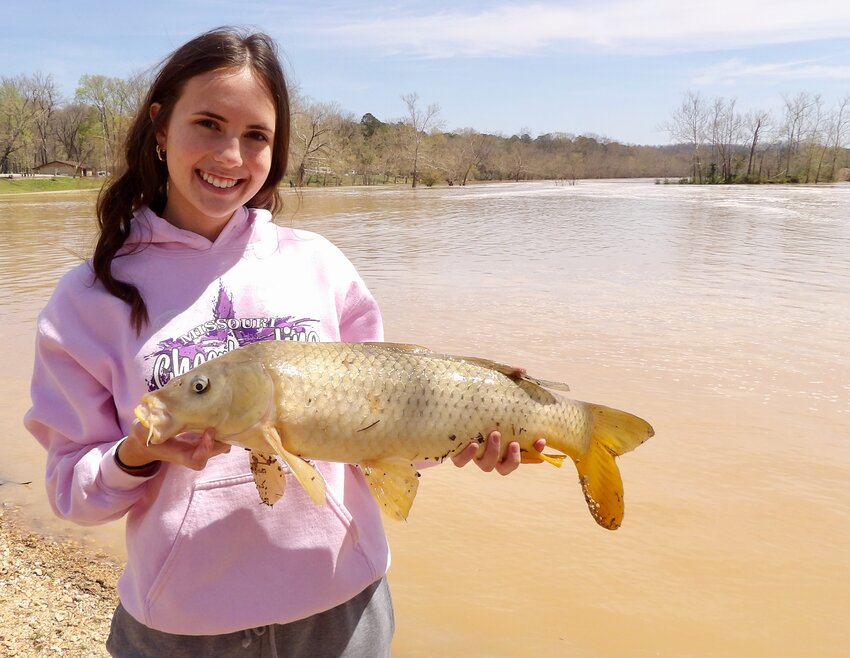 Columnist David Woods recently enjoyed a morning with daughter June, who proved herself to be a handy assistant while fishing for carp.