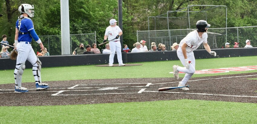 Hunter Roberts of the West Plains Zizzers varsity baseball team drops his bat and starts for first base Thursday as his third-inning shot to left field clears the fence for a three-run homer at Zizzer Ballpark. The Zizzers won the game 5-0 over Bolivar. Roberts also pitched a complete game shutout, only allowing the Liberators one hit.