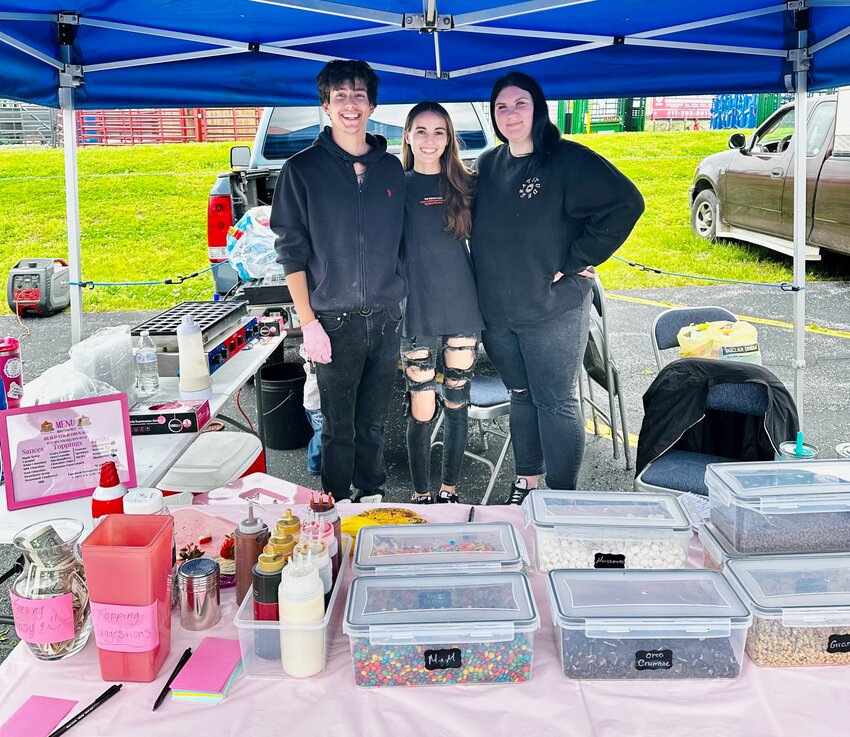 From left, Alexis Hernandez, Raya Havens and Madison Burke make up the Tiny Bites crew, one of the newest vendors to join &ldquo;Go Farm&rdquo; Farmers Market. The trio serve up pancakes with &ldquo;all the toppings.&rdquo;