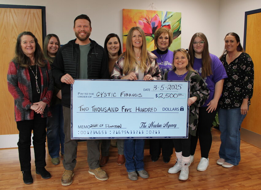 The Newton Agency was a $2,500 donor to the 37th Annual Cystic Fibrosis Concert, the signature fundraiser organized by Cystic Fibrosis of West Plains in an effort to help find a cure and treatments for the genetic disease. Front row, from left: Newton Agency employees Sheri Newton and administrators Jimmy Miller and Amanda Mitchell, and Cystic Fibrosis of West Plains volunteer Jessica Joice-Frazier. Back row: Newton Agency employees LaToya Vandenbulcke and Adrienne Allen, Cystic Fibrosis volunteers Lois Frazier and Katlyn Johnson, and Newton Agency employee Sondra Meaney.