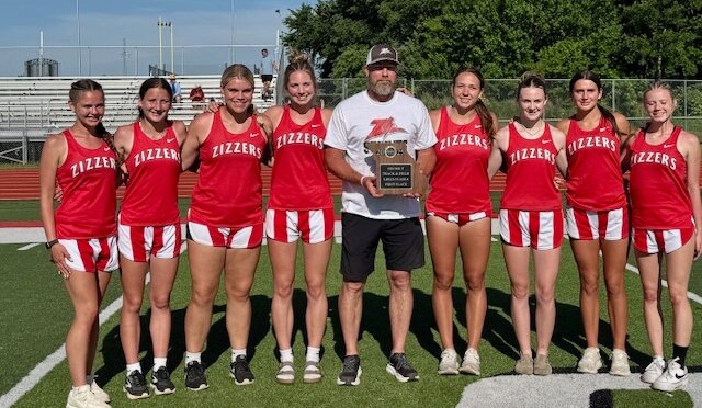 West Plains High School track and field team girls sectional qualifiers from the Class 4, District 6 meet May 17 at Carl Junction are, from left, Karlee Romans, Jocelyn Denny, Shaley Peterson, Emily Ritter, Head Coach Greg Dixon, Ashlyn Tinsley, Lily Dixon, Mylea Adams and Seri King. They will be heading today to the State Sectionals at Waynesville High School.