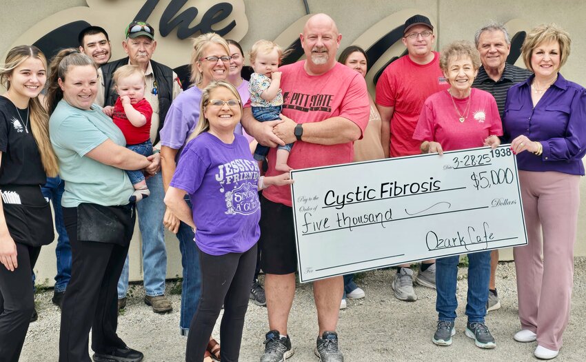 During the annual spring fundraising drive centered around the Cystic Fibrosis of West Plains country music concert, Ozark Cafe donated $5,000 to the cause. The money was raised through a &ldquo;Super Bowl Squares&rdquo; game, the giveaway of a spa basket made by co-owner Kim Eding and the proceeds from the restaurant&rsquo;s Cystic Fibrosis Day. &quot;The Eding family and all their staff at Ozark Cafe work extra hard during our concert time to help us in any way possible. We appreciate all they do for Cystic Fibrosis of West Plains,&quot; said Rick Frazier, a volunteer for the organization. From left: Ozark Cafe employees Samantha Jazdzewski, Brooke Henderson holding Cooper Henderson, and John Marchant; Cystic Fibrosis of West Plains supporter Joe Auffert; Ozark Cafe owner Kim Eding; Cystic Fibrosis volunteer Jessica Joice-Frazier; Ozark Cafe employee Jasmine Roberts, owner Raymond Eding holding Sterling Roberts, employees Amanda Johnson and Chris Johnson, and owner Ella Eding; and Cystic Fibrosis volunteers Rick and Lois Frazier.