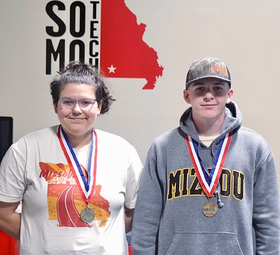 Southern Missouri Technical Institute SkillsUSA members attended the Missouri State Leadership and Skills Conference April 10 through12. Students competed in several different contests, including Auto Service Technology, Photography, T-shirt Design, Basic Healthcare and Health Knowledge Bowl. Three SoMoTech students won medals, including Alyx Dehner, left, who claimed a gold medal for photography, and Dryden Loftis, right, who won a gold medal in T-shirt Design. Fellow student Jenna Semon won bronze in Nurse Assisting Tech Info. Dehner and Loftis will go on to represent MIssouri in the National Leadership and Skills Conference, from June 23 through 27 in Atlanta, Ga. SoMoTech Commercial and Advertising Art Instructor Scott Heidy, who shared this photo with the Quill, enthusiastically wishes them good luck.