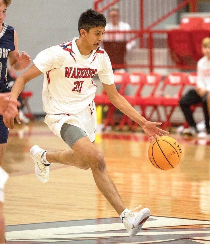 Hector Quinonez hustles the ball down the floor for Washington. The Warriors open the State Playoffs Friday and host Star Spencer. The girls tip off at 6 p.m. and the boys play at 8 p.m.