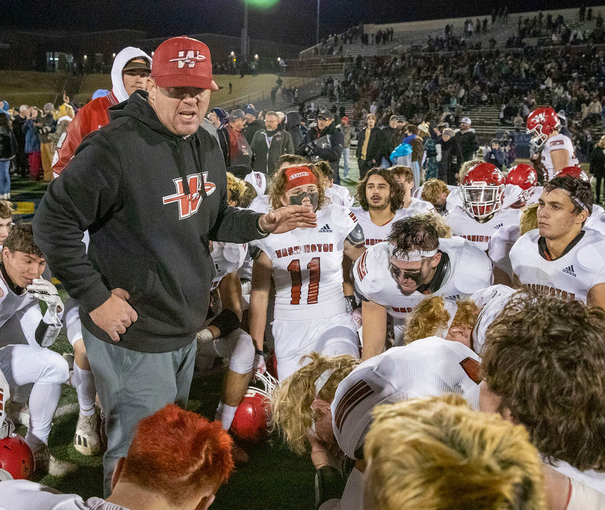 Washington head football coach Brad Beller talks to his team after their 17-13 loss to Marlow in the State finals of the Class 2A State playoffs.